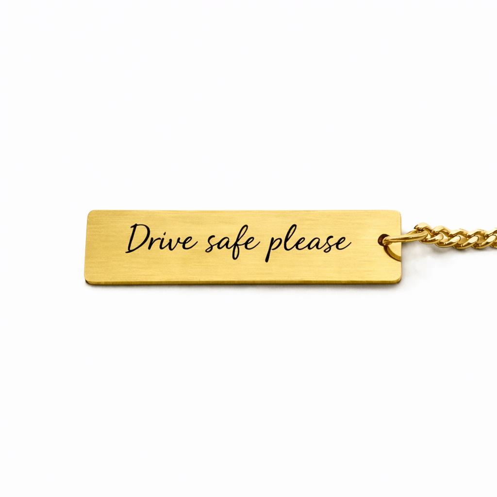 Reverso dorado del llavero con dedicatoria personalizada