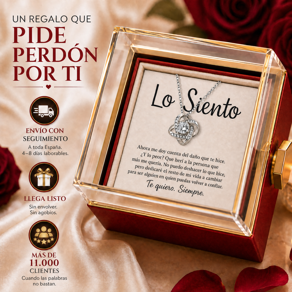 Caja con la rosa giratoria abierta: collar Nudo de Amor en oro blanco sobre la tarjeta «Lo Siento»